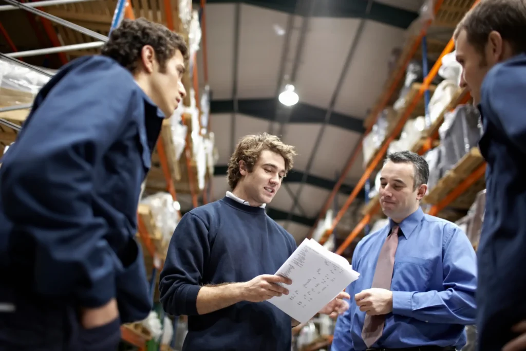 Manager And Workers In Warehouse 2026 03 25 01 29 30 Utc