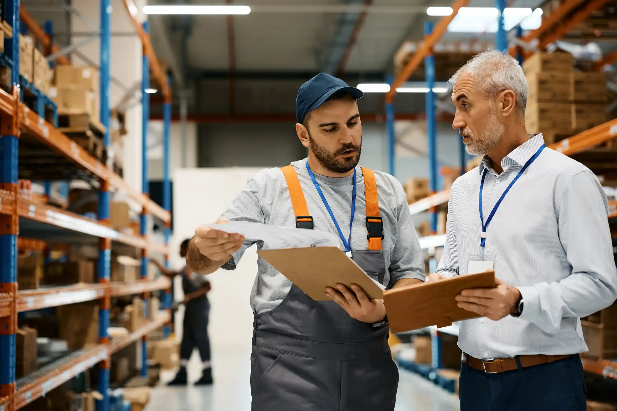 Mature Warehouse Manager And Male Worker Cooperati 2026 03 16 03 28 45 Utc